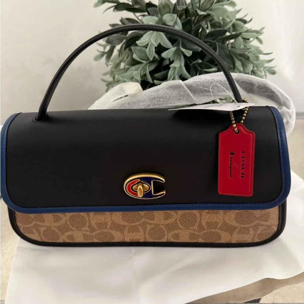 Coach X Champion Turnlock Clutch In Signature Canvas